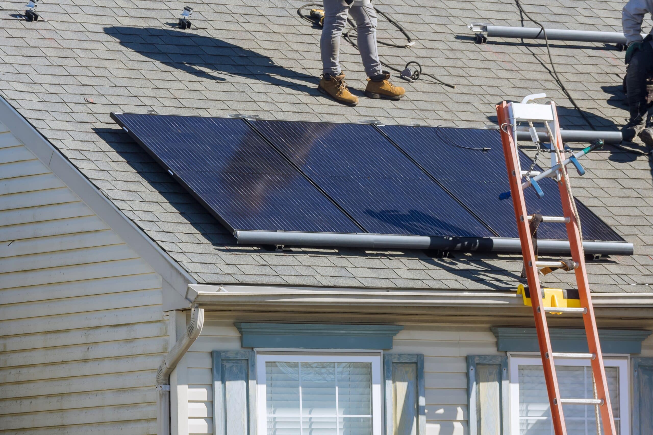 installed solar panels in use on roof of home