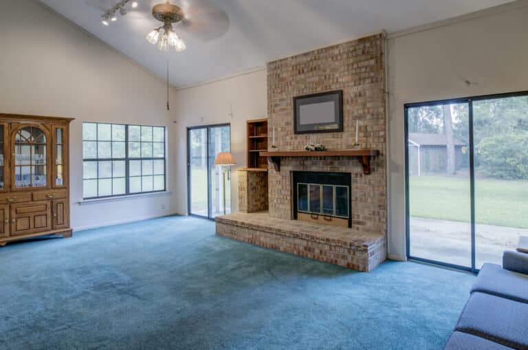 simple living room in need of remodel.