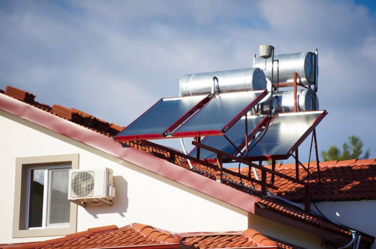 solar heaters on the roof of the house