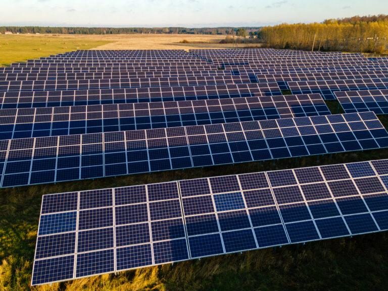 solar panels station on field