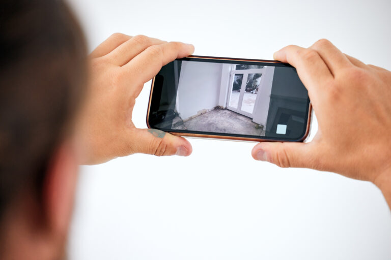 surveillance cctv and smartphone screen in hands 2022 12 16 02 19 33 utc (1)