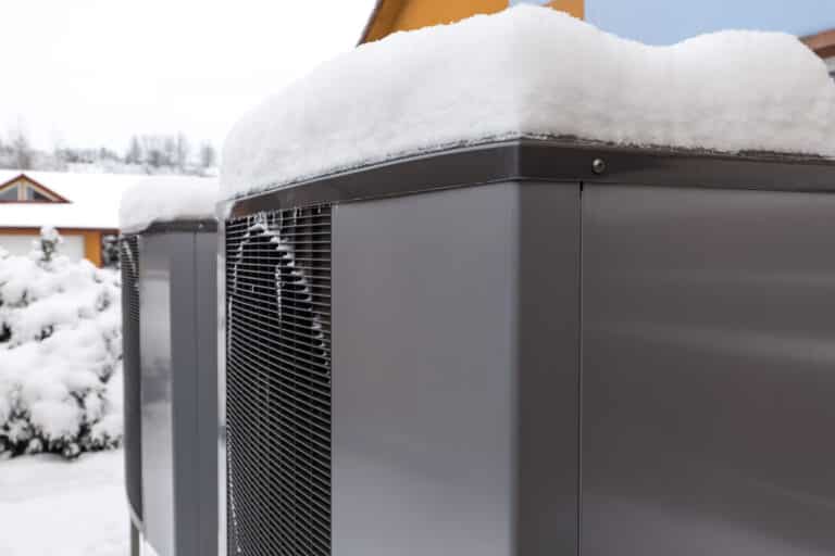 two residential modern heat pumps
