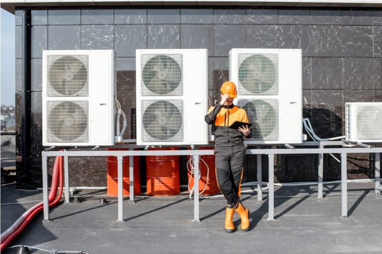 workman servicing air conditioning or heat pump wi 2021 09 01 16 05 40 utc