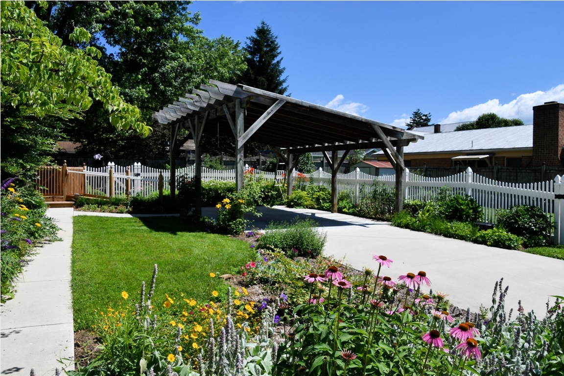a landscaped carport patio in a typical middle cla 2022 11 14 04 07 25 utc
