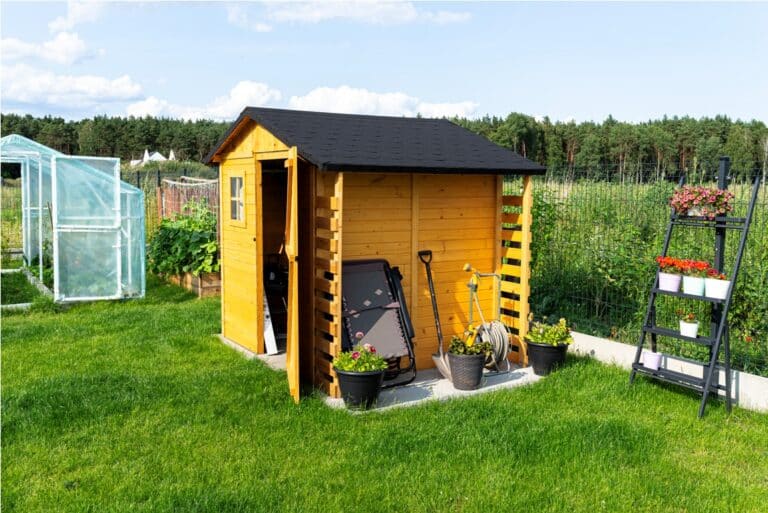 a wooden garden shed standing on a concrete founda 2023 07 18 04 08 12 utc (1)