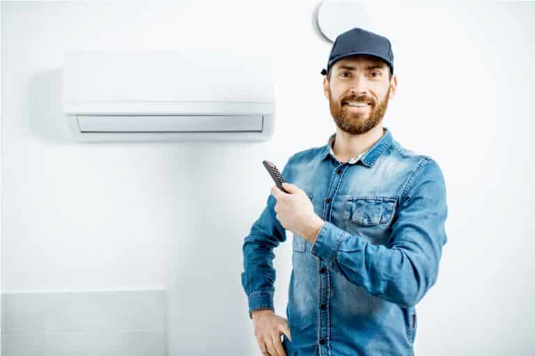 portrait of a man serving the air conditioner 2021 11 01 22 03 35 utc