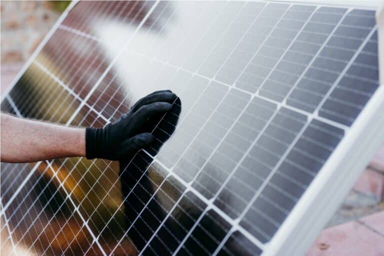 technician man checking solar panels for self cons 2022 10 11 20 15 33 utc