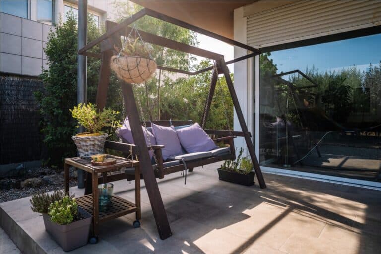 veranda with swing in sunny weather 2023 02 11 06 59 46 utc