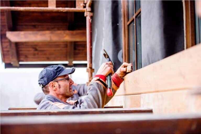 construction worker thermally insulating house do 2021 08 26 12 08 30 utc