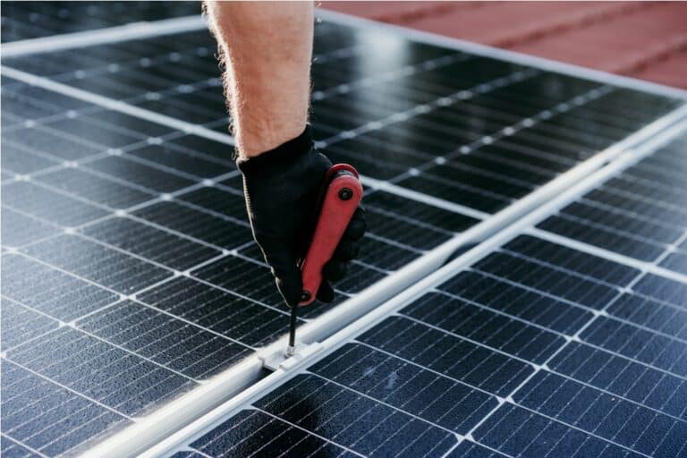 mature technician man assembling solar panels with 2022 10 11 20 15 30 utc