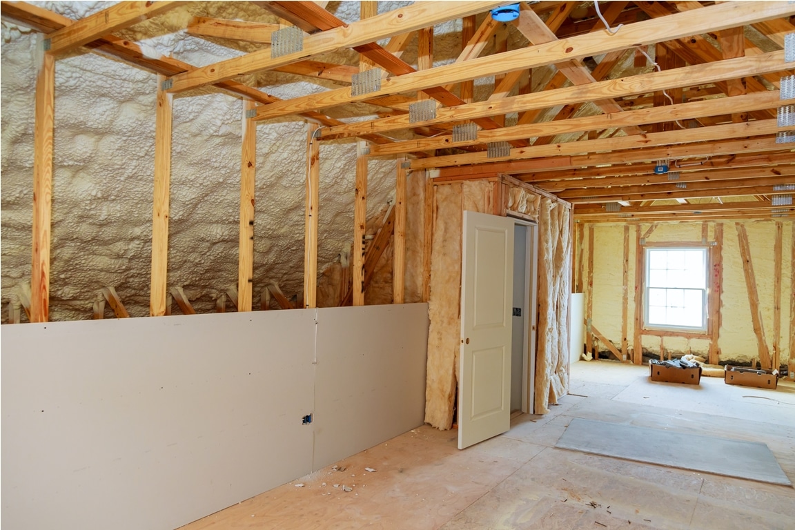 termal insulation installing at the attic insulation of the house