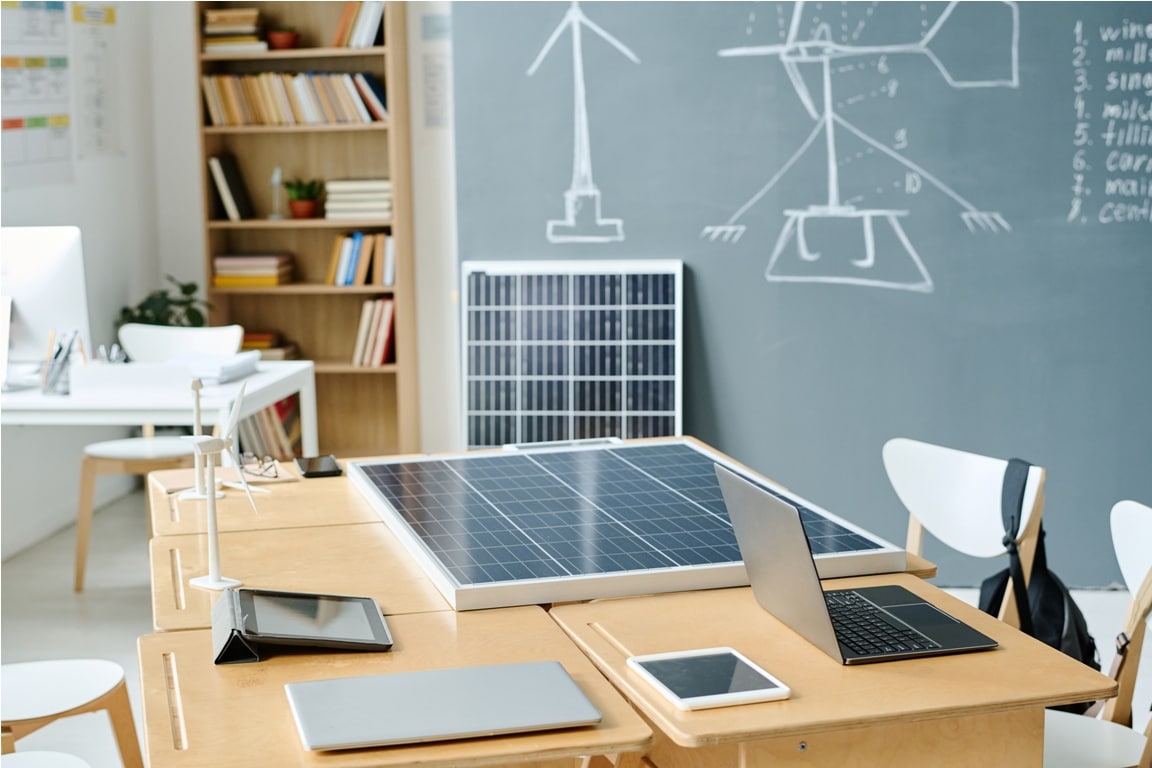 empty classroom with solar panel on table at school