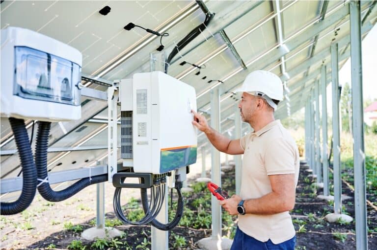 professional worker checking voltage on solar inve 2023 08 02 07 29 57 utc