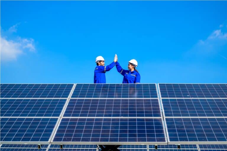 solar panel station, engineer installing solar panel at solar energy farm field