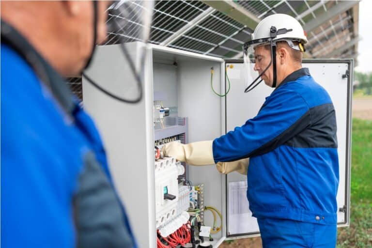 two service engineers or electrician working on ch 2023 08 11 21 16 21 utc